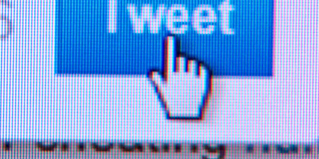 A mouse pointer hovering over a tweet button